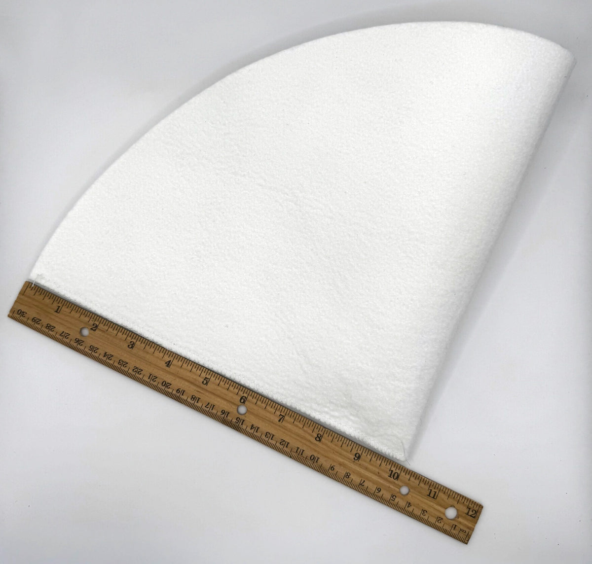 1 quart Orlon cone filter next to a 12 inch ruler, about 9.75 inches along the seam