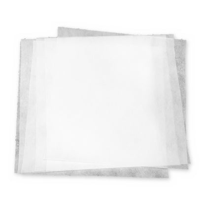 Stack of 18 x 18 inch Reemay flat prefilter sheets on a white background